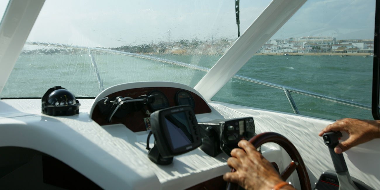 crew at the helm