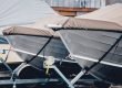 Shrink wrapped powerboats at a boat storage facility